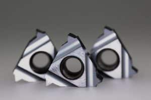 Carbide alloy metal inserts