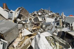 Scrap yard with a variety of used household appliances 