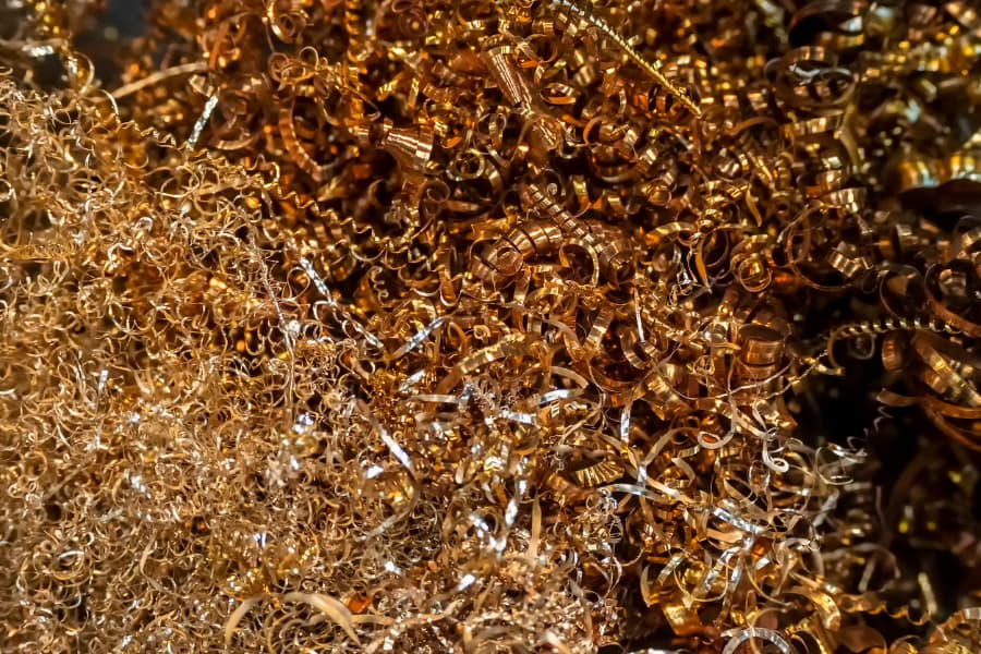 Close-up image of scrap brass turnings