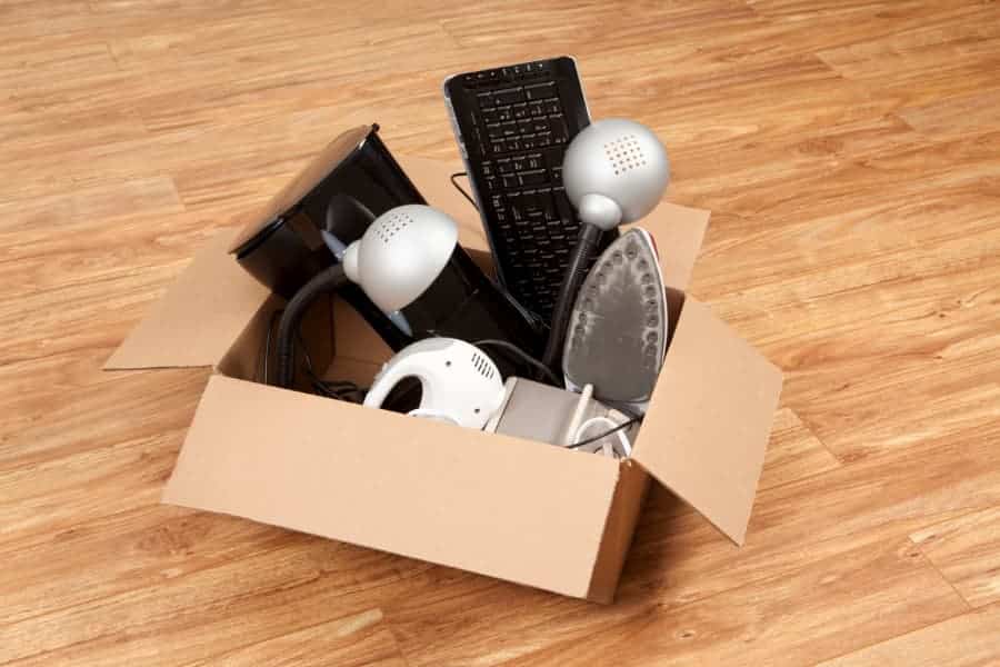 Cardboard box filled with household appliances