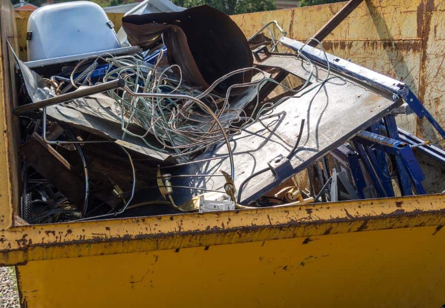 Large amount of various scrap metal collected inside container
